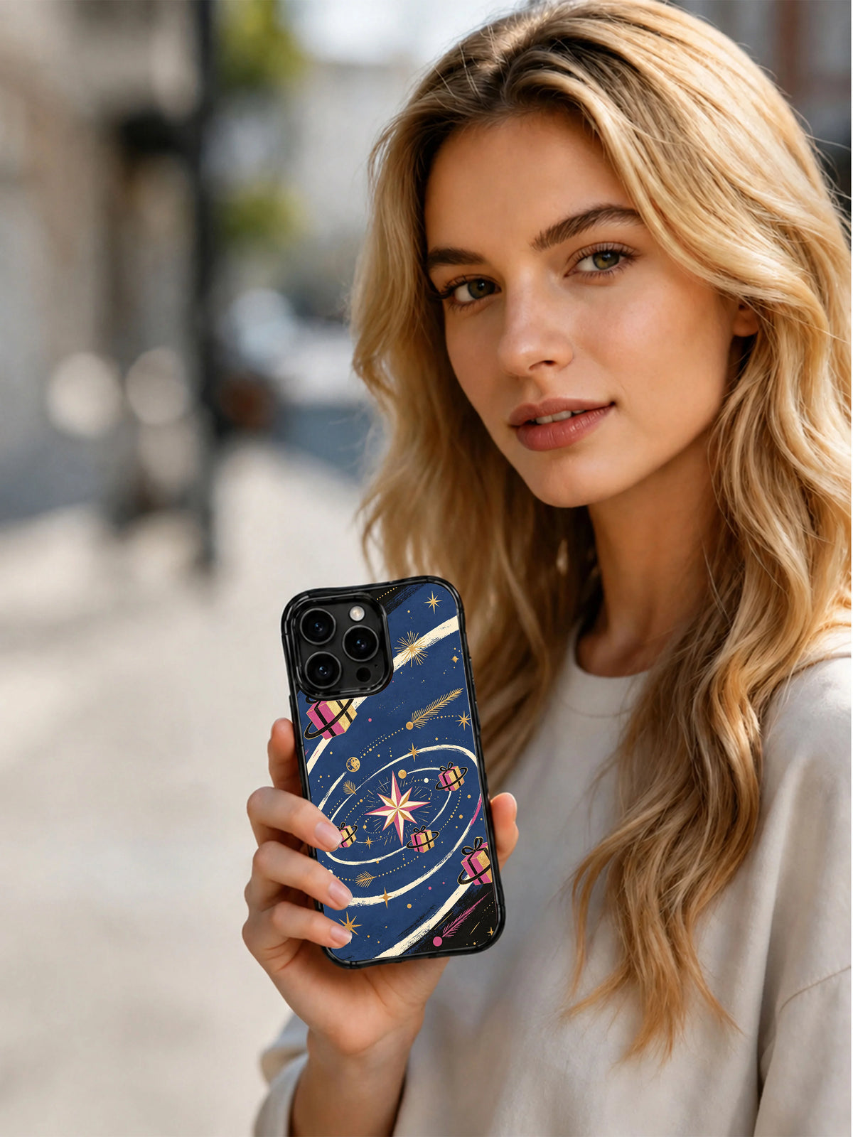 Orbit of Unopened Gifts iPhone 14 Pro case held in a lifestyle scene