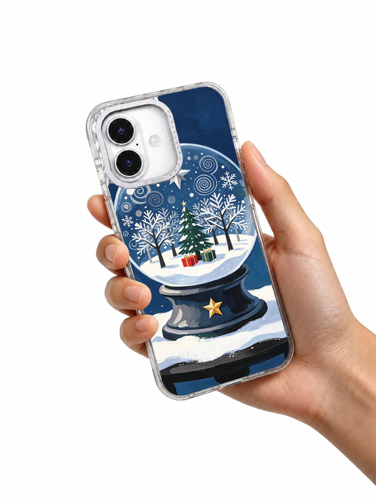 Orchard Inside the Snow Globe iPhone 17 case held in hand