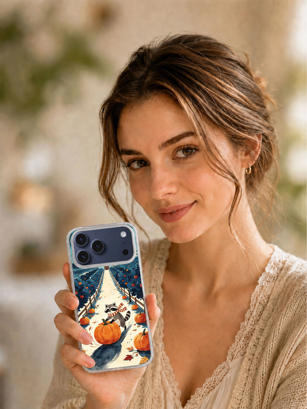 Lifestyle view of Orchard of Midnight Pumpkins iPhone case