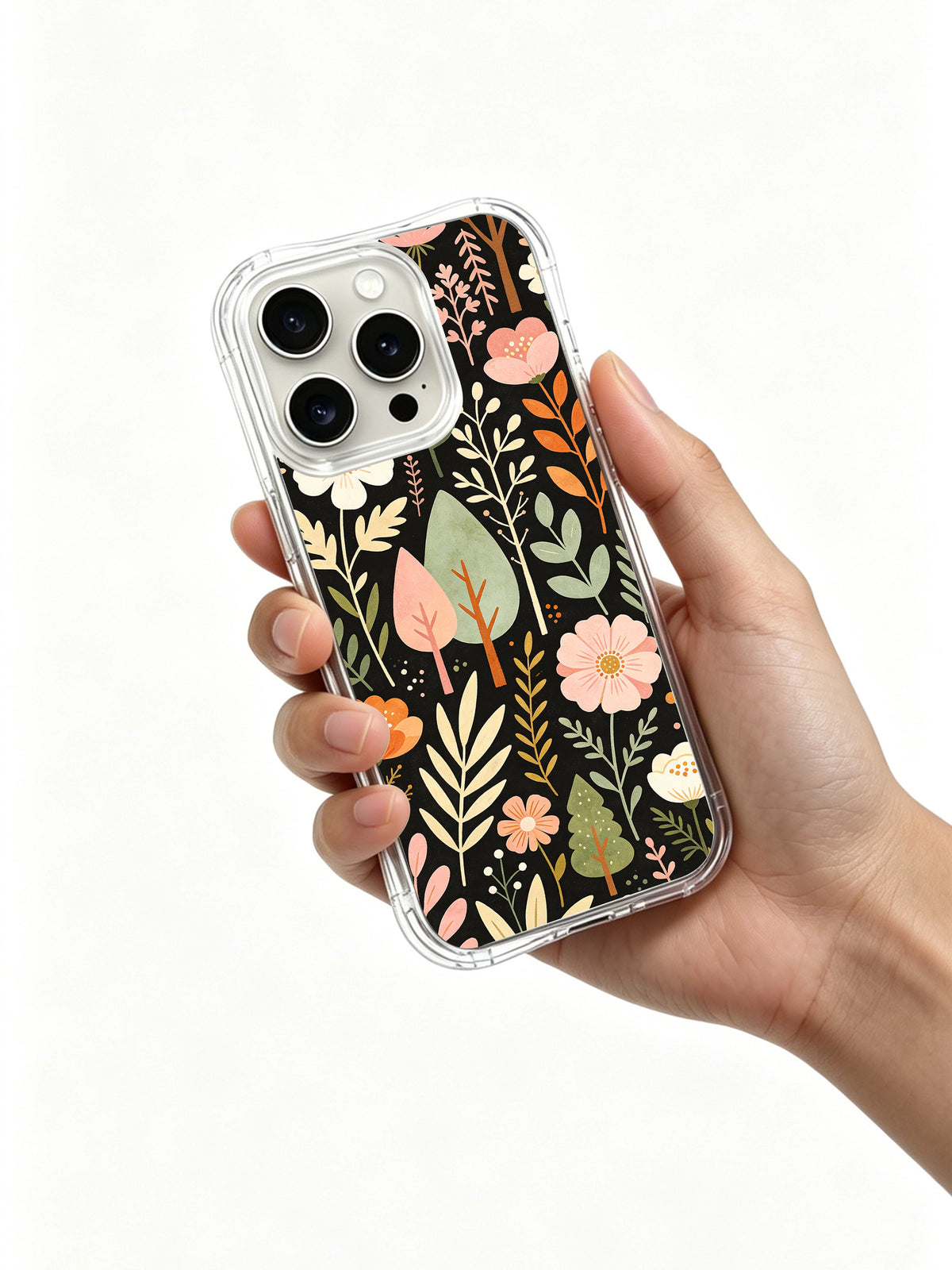 Pastel Forest Language floral iPhone 15 Pro case in hand