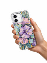 Pastel floral art iPhone 17 case held in hand