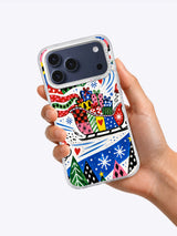 In-hand product view of Patchwork Sleigh artwork on an iPhone 17 Pro Max case