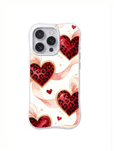 Ribbon Leopard Hearts red black blush cream and gold-colored heart and bow artwork on an iPhone case