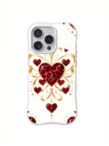 Golden Bow Heart Crest red black blush cream and gold-colored heart and bow artwork on an iPhone case