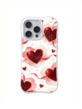 Blush Ribbon Heart Garden red black blush cream and gold-colored heart and bow artwork on an iPhone case