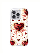 Pearl Bow Heart Parade red black blush cream and gold-colored heart and bow artwork on an iPhone case