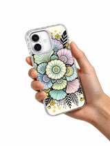 Pearl flower art iPhone 17 case held in hand