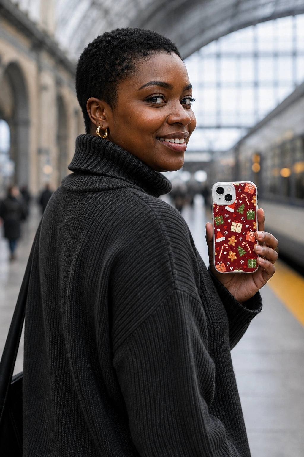 Adult woman at a train station holding the Peppermint Gift Parade iPhone 14 Plus case with Peppermint Present March artwork