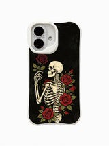 PhoneCasing Black Rose Oath fine art iPhone 16 Case, original Morrigan Vale traditional old-school goth tattoo artwork with vintage skeleton clutching deep crimson roses against distressed solid black backdrop, scratch resistant glossy casing crafted in California