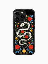 PhoneCasing iPhone 16 pro max Case featuring a coiled bone snake skeleton on a solid black background, surrounded by red roses, yellow flowers and blue leaves, creating a bold folk art print on iPhone 16 pro max casing.