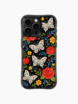 PhoneCasing iPhone 16 pro max Case with sugar skull butterflies, red roses, yellow flowers and small red hearts scattered across the design, set against a black background with blue vines, whimsical folk design for iPhone 16 pro max casing