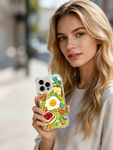 Candy-color dinosaur breakfast artwork on an iPhone 16 Pro case