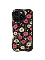 PhoneCasing iPhone 16 pro Case with edgy grunge black base and vertical blooming pink daisy heart motifs, Ruby Daze Pink Static Garden wavy design for daily stylish streetwear wear.
