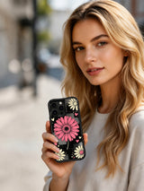 PhoneCasing iPhone 16 pro Case with scattered cream small daisies, soft pink cream tiny hearts and halftone speckle accents surrounding central raspberry bloom, part of Ruby Daze collection, UV-printed wavy art casing.
