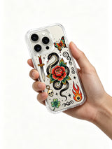 Rose serpent with butterflies and skull charm artwork on an iPhone 15 Pro case