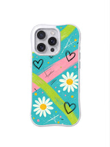 PhoneCasing iPhone 16 pro Case with scattered mini speckle dots and thin scratch mark scribble doodles as subtle layered summer picnic texture details, exclusive Ruby Daze wearable wavy frame floral sketch art.