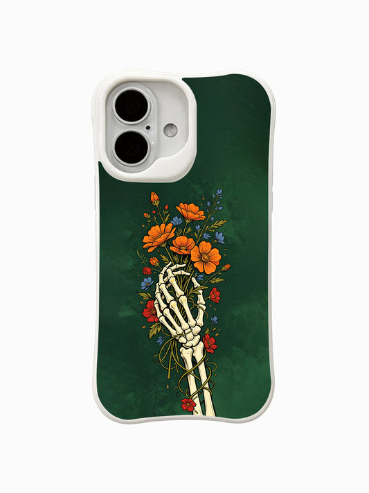 PhoneCasing Emerald Soul fine art iPhone 16 Case, vintage old-school goth tattoo artwork by Morrigan Vale, skeletal hand gripping orange cosmos blooms with winding vines against moody dark emerald textured green backdrop
