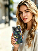 PhoneCasing iPhone 16 Pro Max Case featuring an ethereal wildflower garden design. Purple, yellow and white blooms, vibrant floral print made in California.