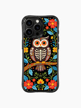 PhoneCasing iPhone 16 pro max Case with a skeleton owl representing wisdom and dreams, perched on a floral branch surrounded by folk flowers and leaves, Day of the Dead inspired print on black iPhone 16 pro max casing.