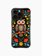 PhoneCasing iPhone 16 pro max Case with a skeleton owl whose feathers are adorned with intricate folk patterns, perched on a branch surrounded by blooming flowers and leaves, whimsical folk design on iPhone 16 pro max casing.