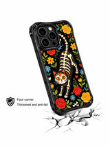 PhoneCasing iPhone 16 pro max Case with a playful floral skeleton cat in tail-up prowling pose, surrounded by bright folk flowers and bone details, sugar skull folk art by Estrella Nocturna, stylish black iPhone 16 pro max casing.