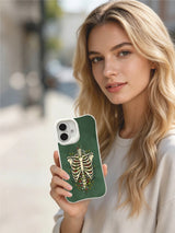 Forest-green wild fruit and skeleton on an iPhone 16 case
