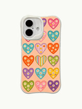 PhoneCasing Artist-designed hearts iPhone 16 plus case, stitched heart appliques with daisy and dot details, premium iphone 16 plus casing.