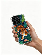 Deep indigo tropical garden setting with layered jungle leaves framing stoic orange striped guardian beast portrait iPhone 13 pro Case from PhoneCasing, ultra-thin anti-yellow iPhone 13 pro casing paired with varied seasonal wild blooms, minimalist tropical vintage animal phone cover.
