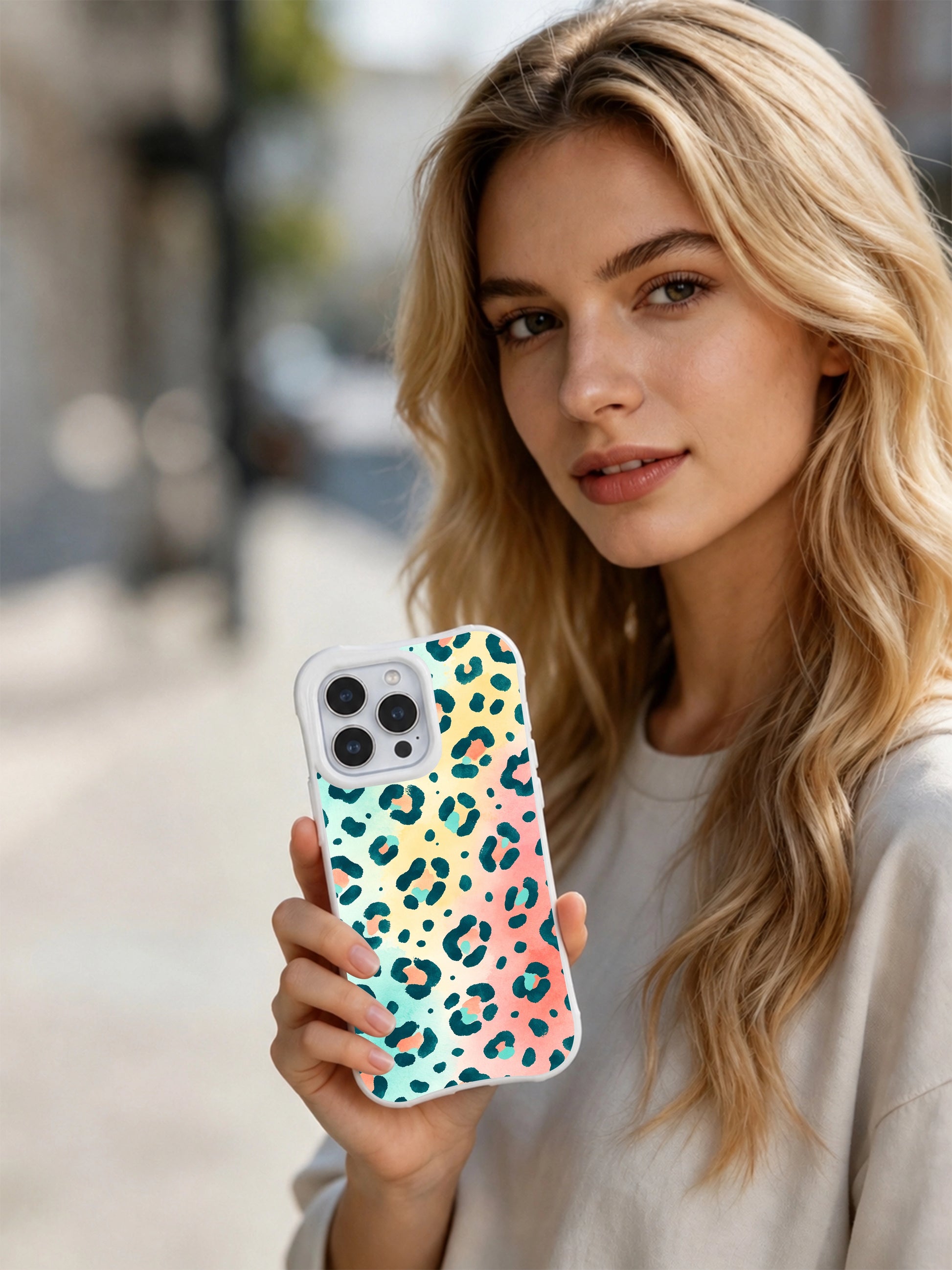Vibrant tropical watercolor leopard PhoneCasing iPhone 14 Pro Case exclusive from Roxy Wildhart’s Wild Heart Safari line. Seamless mint-coral-sandy gradient, loose hand-painted spot texture, smooth anti-microbial clear case.