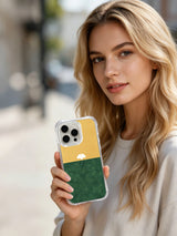 Single ginkgo leaf over a horizon artwork on an iPhone 15 Pro case