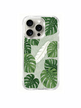 Monstera and feather totem composition artwork on an iPhone 15 Pro case
