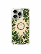 Illustrated oak and thorn wreath artwork on an iPhone 15 Pro case
