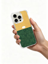 Minimal two-tone ginkgo geometry artwork on an iPhone 15 Pro case