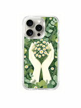 Minimal green hands with flowers artwork on an iPhone 15 Pro case