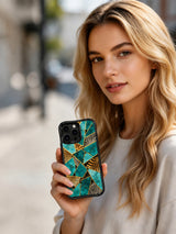 PhoneCasing iPhone 15 pro max case from the Wild Gilded Safari collection, turquoise gold beast print design, dreamy exotic artistic phone cover.