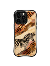 PhoneCasing iPhone 15 pro max cover in warm natural light, showing sunbaked leather-like bronze tiger texture, vintage warm luxury phone case.