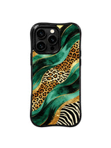 PhoneCasing iPhone 15 pro max cover in lifestyle setting, showing elegant emerald leopard gold river print, everyday luxury phone case.