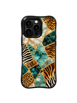 PhoneCasing iPhone 15 pro max cover in natural light, showing light-catching faceted gem edges and metallic gold glow, luxury art phone case.