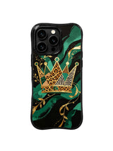 PhoneCasing iPhone 15 pro max cover in event lifestyle setting, showing regal wild crown print, event-ready luxury art phone case.