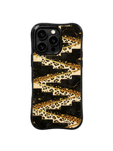 PhoneCasing premium iPhone 15 pro cover compatible with iPhone 15 pro max, held in hand showing sharp zebra gold foil staircase design, non-slip minimalist luxury phone casing.