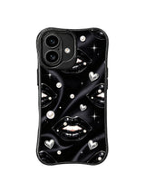 PhoneCasing iPhone 16 case featuring black lips, silver hearts, white pearls, and tiny stars on a dark satin-style background.