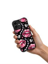 PhoneCasing iPhone 16 case with black background, pink tiger lips, and rhinestone sparkle, styled as a standout iphone 16 cover.