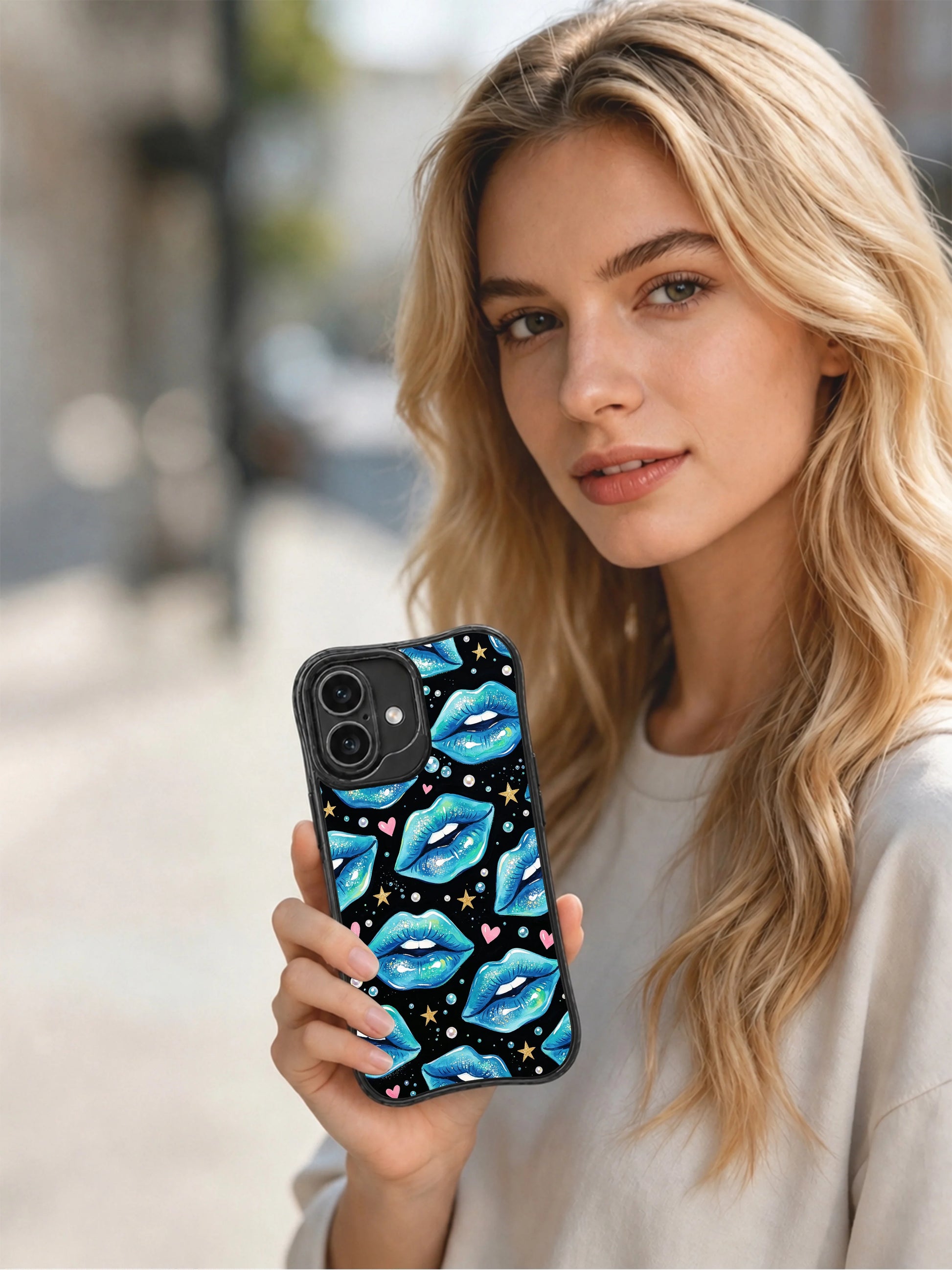 PhoneCasing iPhone 16 case with blue lips, gold stars, floating pearls, and a luminous design that also suits iPhone 16 Pro case searches.