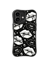 PhoneCasing iPhone 16 case featuring Monochrome Illusion Kiss artwork with black and white lips, optical stripe details, silver beads, and star accents.