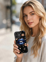PhoneCasing iPhone 16 case featuring Roxie Vell blue night lips artwork with sparkling galaxy texture, gold lips, and tiny celestial details.