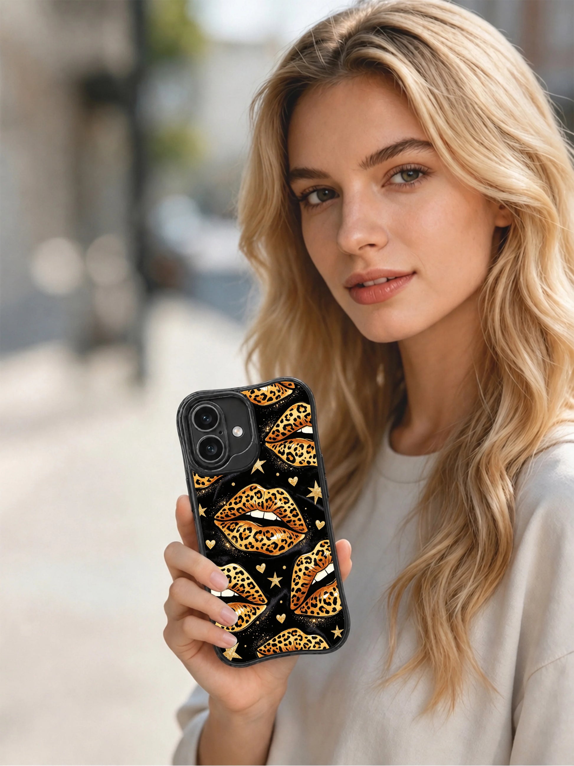 PhoneCasing iPhone 16 case featuring Roxie Vell leopard glam artwork with glossy cheetah lips, gold stars, and a sleek black ground.