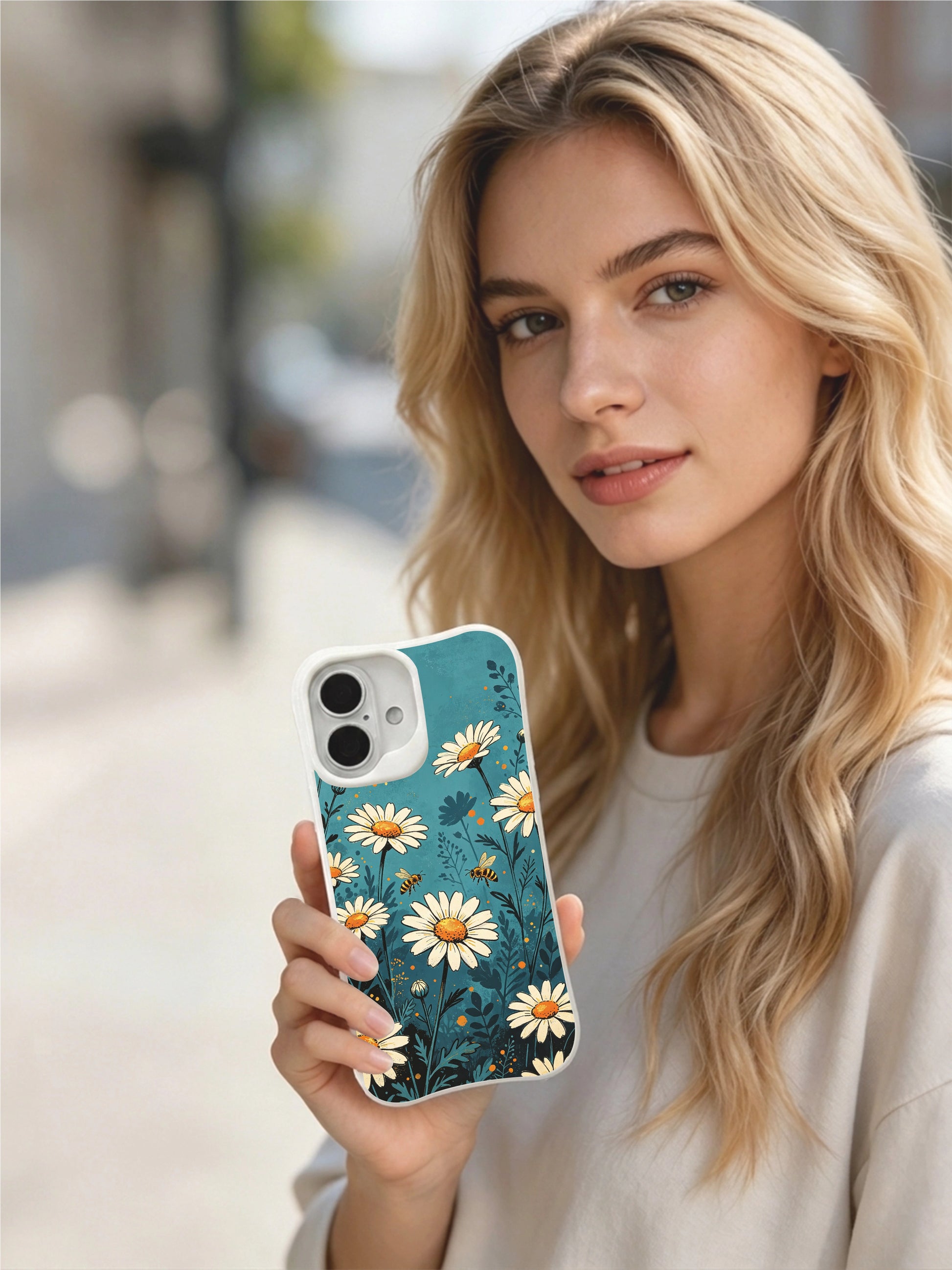 First Light Daisy Chorus art by Mira Bloomwell on this PhoneCasing iPhone 16 Plus Case, with scratch-resistant, antimicrobial gloss finish.