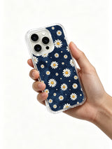 PhoneCasing iPhone 16 Pro Max Case with dark blue daisy art from Mira Bloomwell’s Midnight Daisy Rain collection, a unique artistic accessory for women.