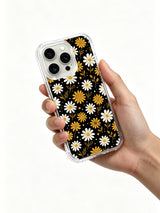 PhoneCasing iPhone 16 Pro Max Case featuring the moody yet warm golden and white daisy print from artist Daisy Vale, a statement-making case that blends art and positivity.