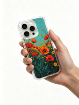 Red poppy burst with daisies on an iPhone 16 Pro Max case